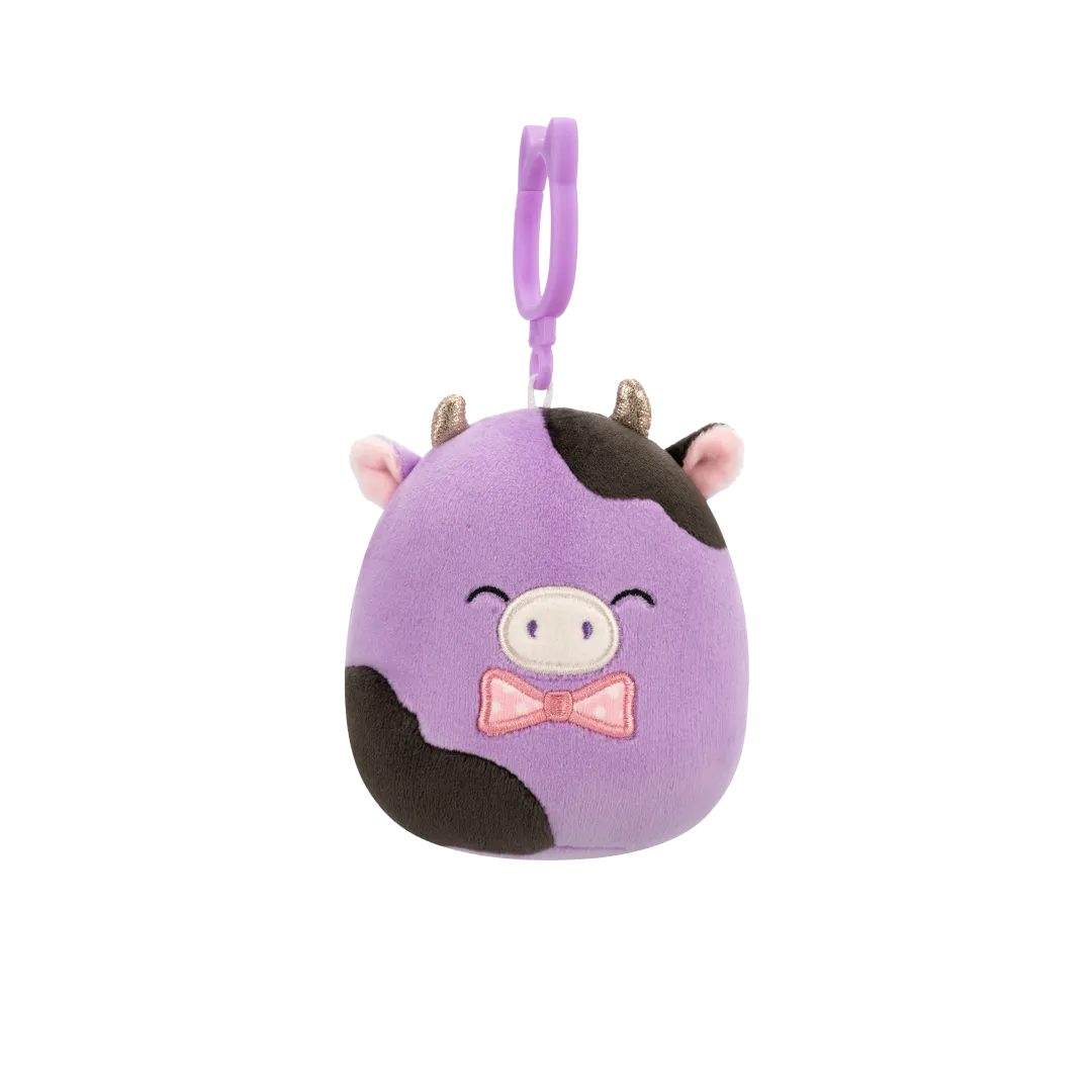 Squishmallows Clip-On Alexie de paars/zwarte koe met strik, 9 cm